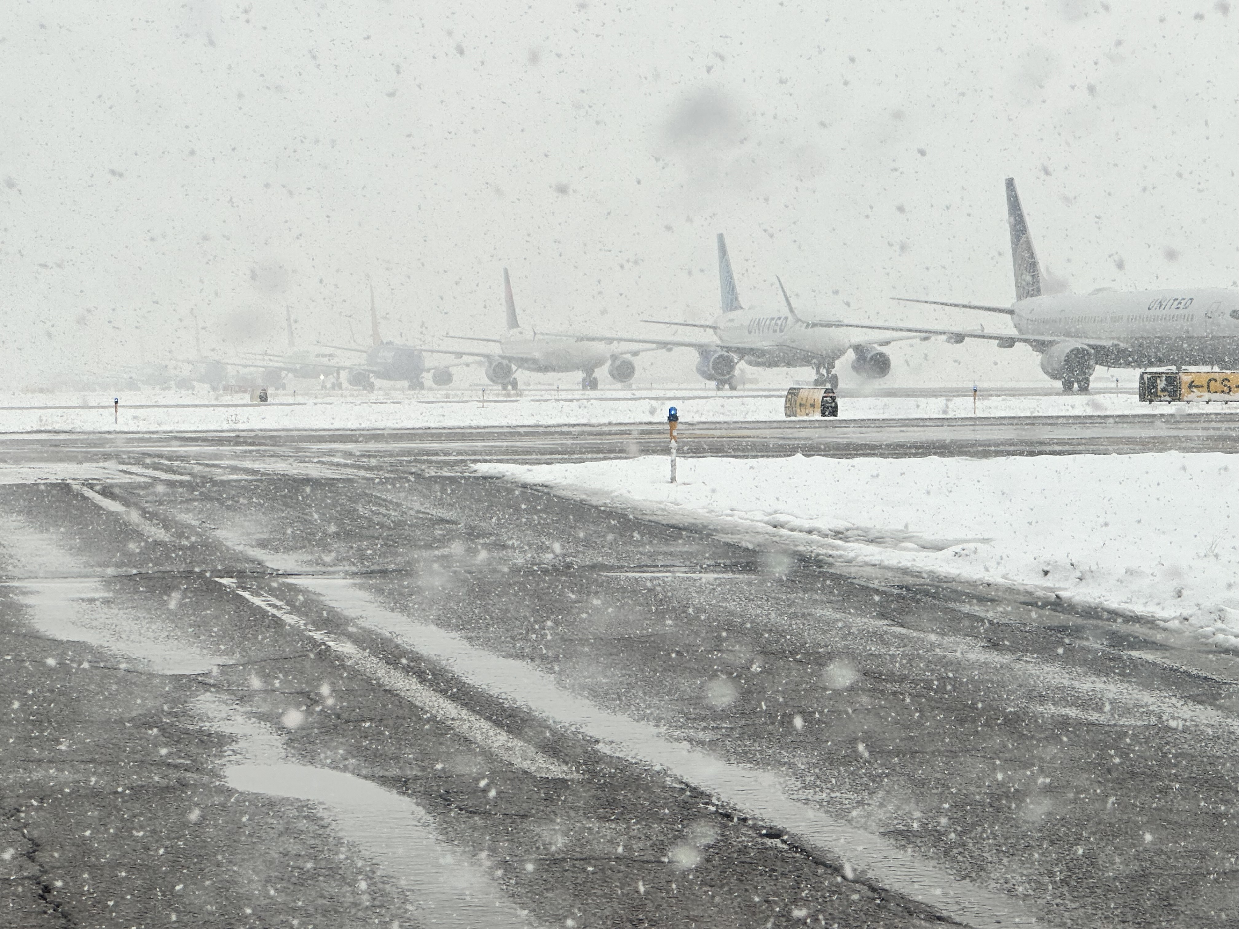 Parked aircraft during snow event
